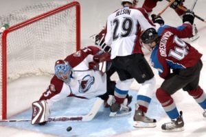 goalie defending to illustrate defensive stocks