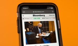 A cellphone with a Joe Biden article.