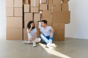 couple with moving boxes