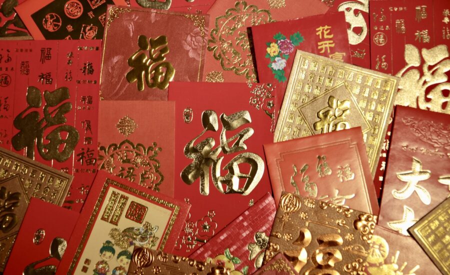 Why do we give out red envelopes for the Lunar New Year?