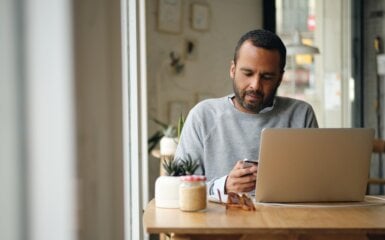 A man works from his home office