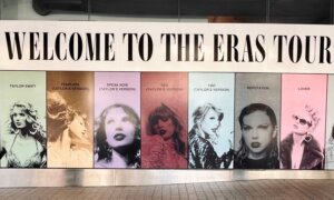 A large poster with seven photos of Taylor Swift and the words "Welcome to the Eras Tour"