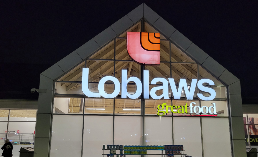 A Loblaw storefront lit up at night