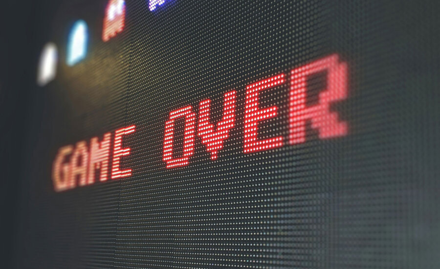 Screen that says "game over." But our columnist poses the question, is the game really over meme stocks, like GameStop.