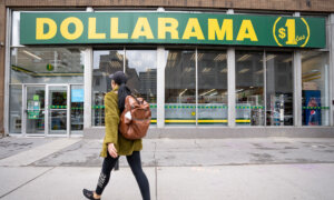A person walks past a Dollarama store in Montreal, Wednesday, June 7, 2023.