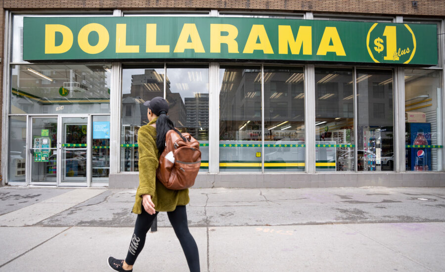 A person walks past a Dollarama store in Montreal, Wednesday, June 7, 2023.