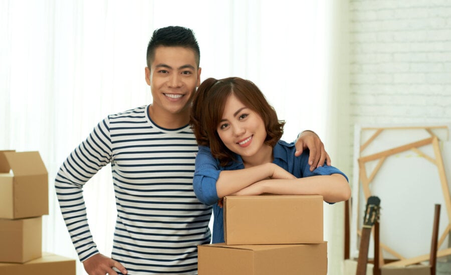 A Canadian son with his mom, moving into the condo she helped him pay for.