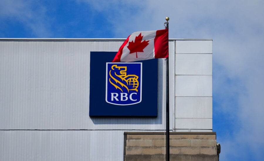 Canadian flag in front of a local bank branch