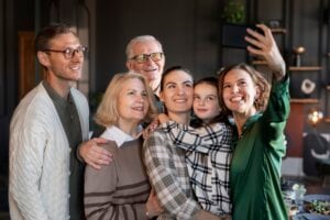 Multi-generational family poses for selfie