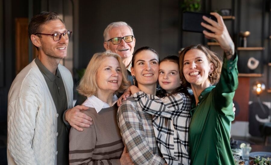 Multi-generational family poses for selfie