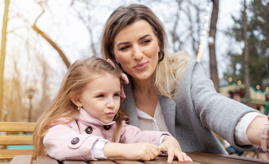 Mother and daughter outside