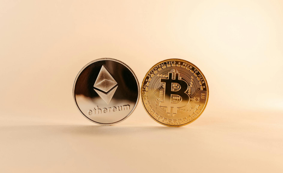 Two coins with the ethereum and bitcoin logos