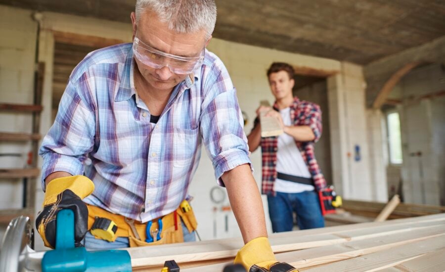 Carpenter works on home improvement project