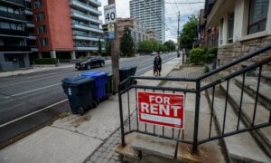 A for rent sign outside a home in Toronto