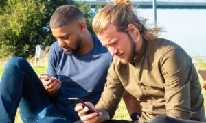 Two Canadian investors looking at options trading.