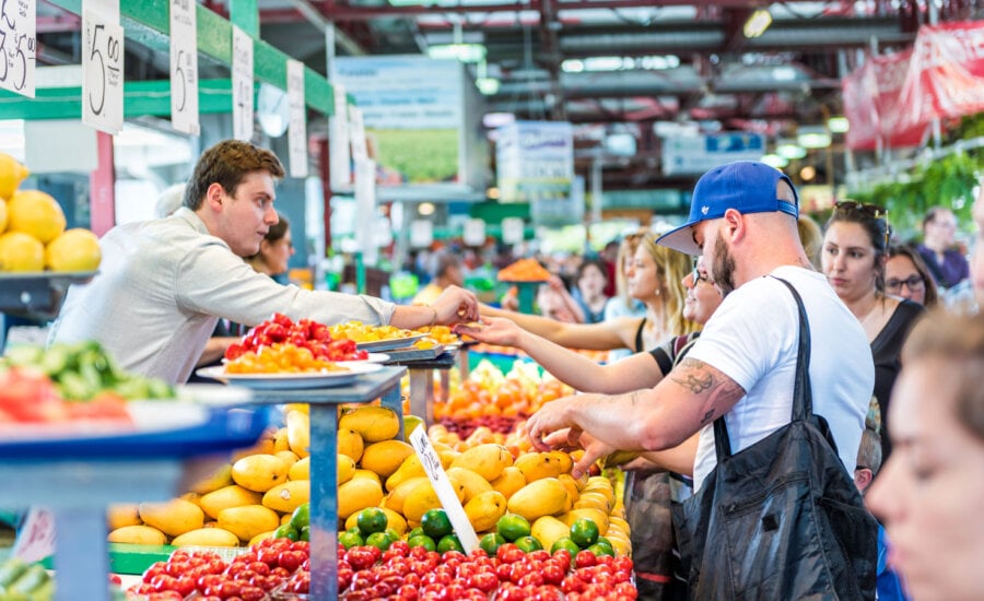 Canadians shopping for fresh foods at a market in Montreal, as food inflation doesn't seem to be going down.