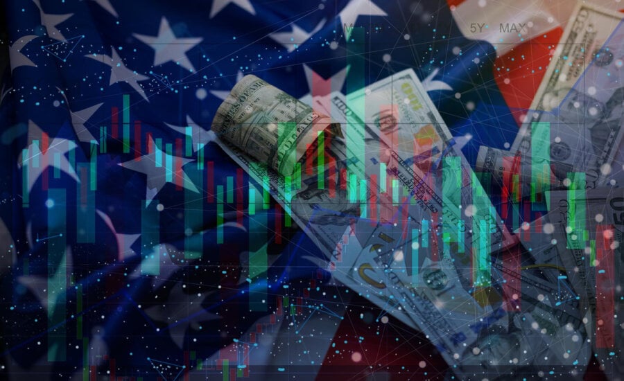 US money, US flag and stock market graphs.