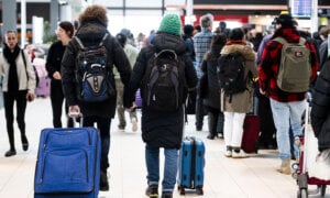 People walking at a Canadian airport, as talk about passenger rights changes are a buzz.