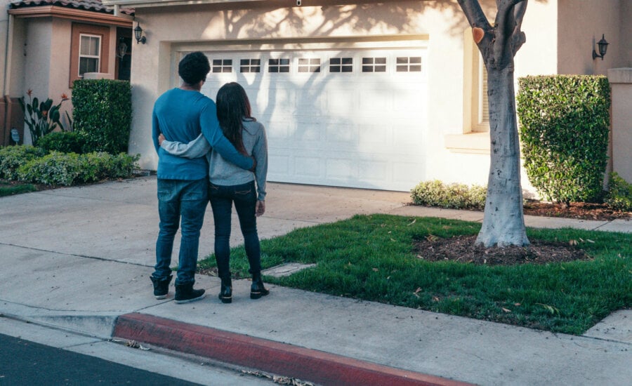 Canadian couple outside of home, wondering if they should transfer it to their corporation.