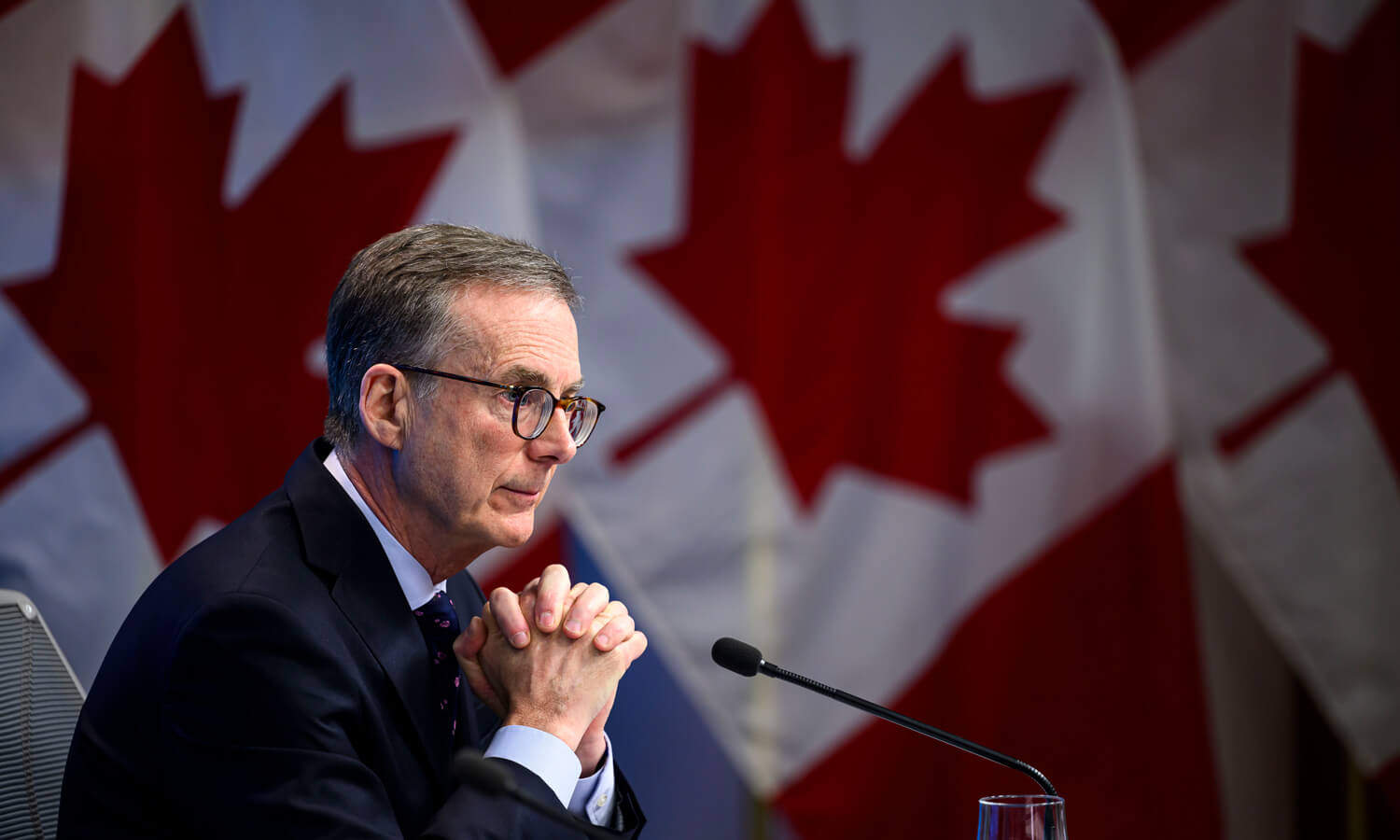 Bank of Canada drops its key rate, points toward inflation and tariffs