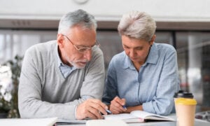 A Canadian couple going over the duties of a power of attorney for property and if they should hire someone for the role.